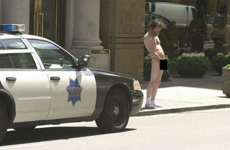 Naked Man Peeing In Front Of Police Car